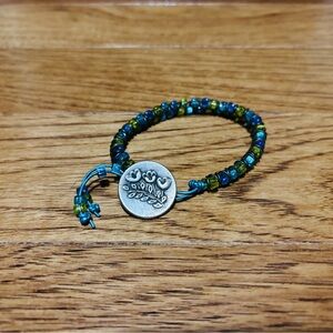 Beaded Bracelet with Floral Button